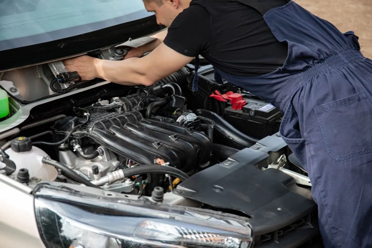 Battery service under the bonnet